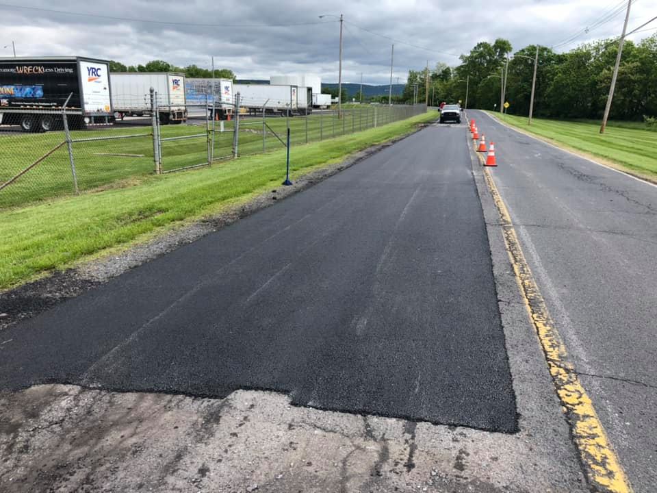 roadway paving trucking for asphalt repairs